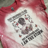 They whispered to her you cannot withstand the storm. She whispered back I am the storm red bleached tee