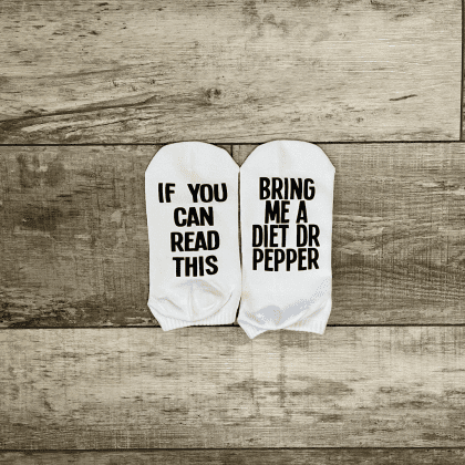 if you can read this bring me a diet dr pepper socks black lettering on the bottom of the foot