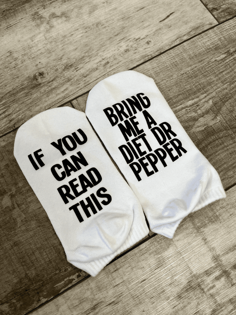 if you can read this bring me a diet dr pepper socks black lettering on the bottom of the foot